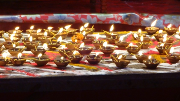 Diya(earthen lamps) lit by devotees for worship to Goddess Durga, the God of Power.@ http://agileopedia.com